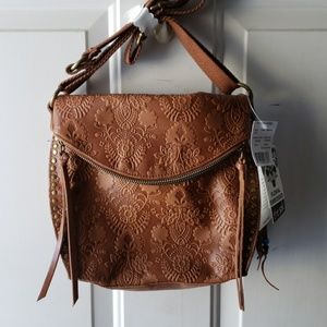 Leather purse by the sak